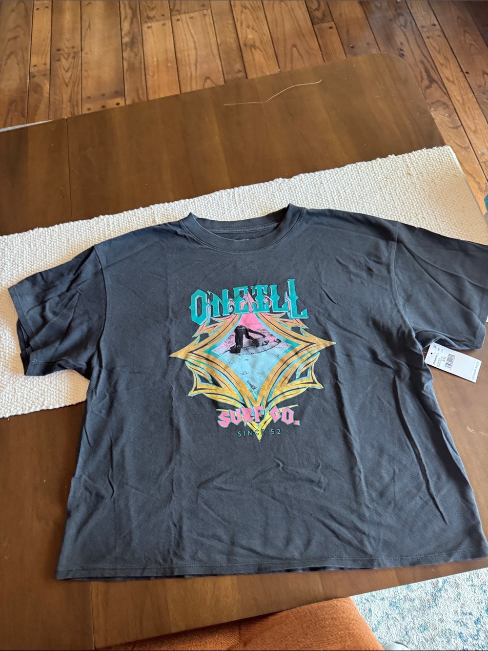 O'Neill Black Graphic Short Sleeve Tee with Turquoise and Pink Logo